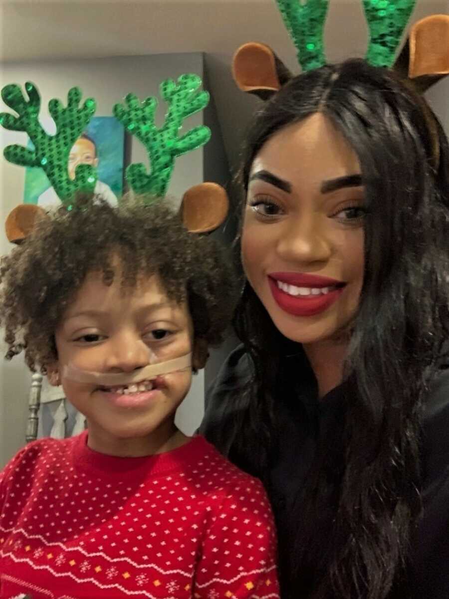 mom and son taking a selfie in the hospital