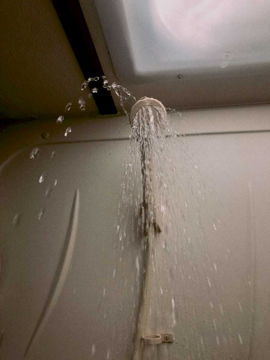 shower head with trickling water coming out