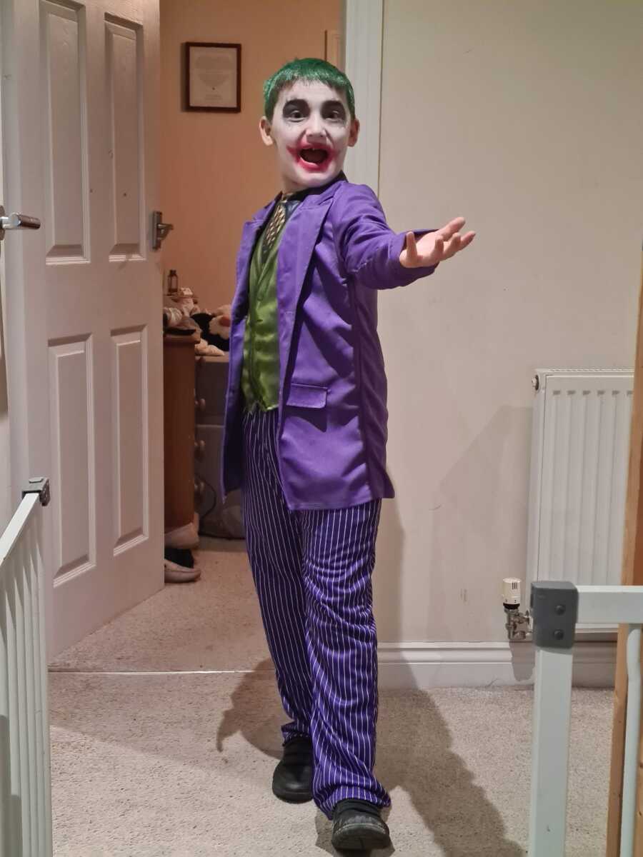 little boy dressed up as the joker