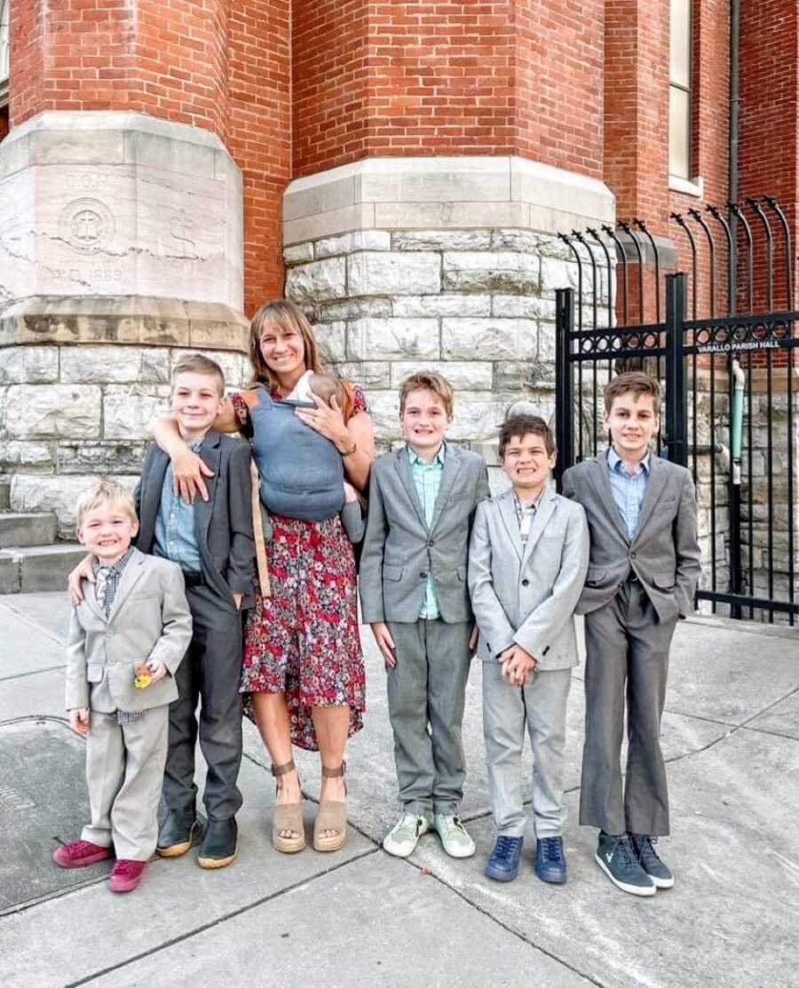 Mom stands with her six children in their Sunday best on Easter Sunday