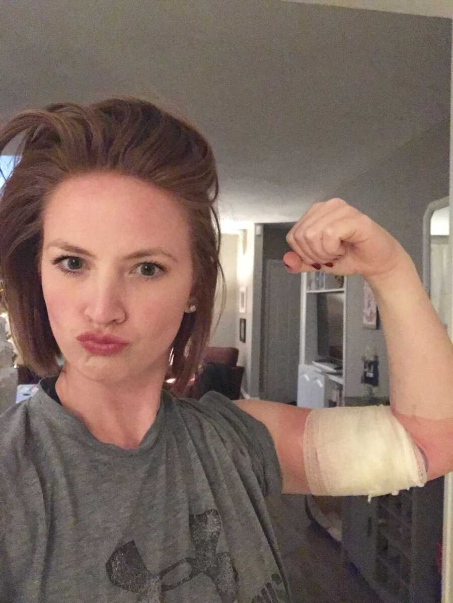 woman showing her strength