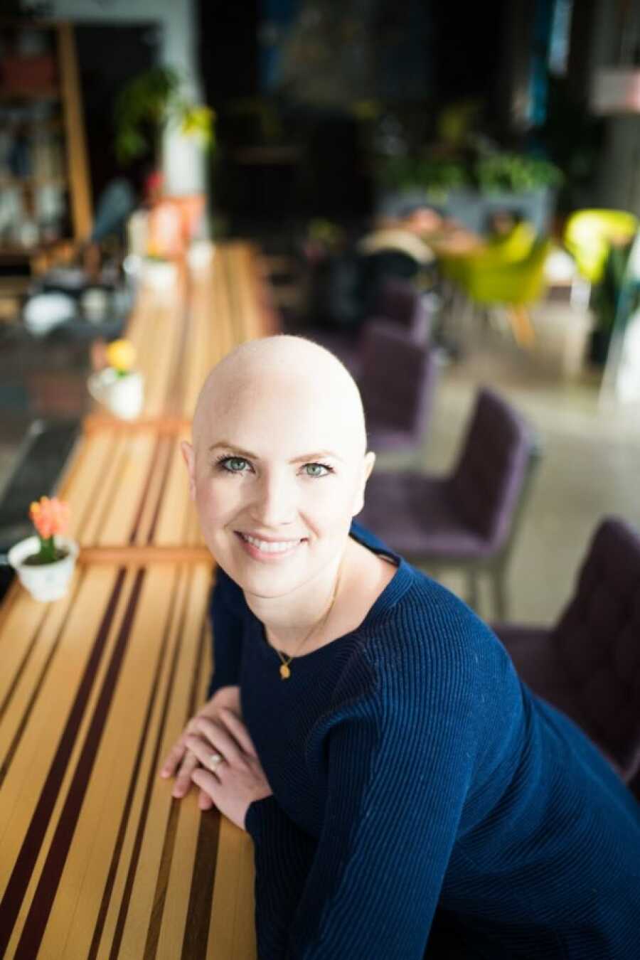 woman with cancer taking a head shot