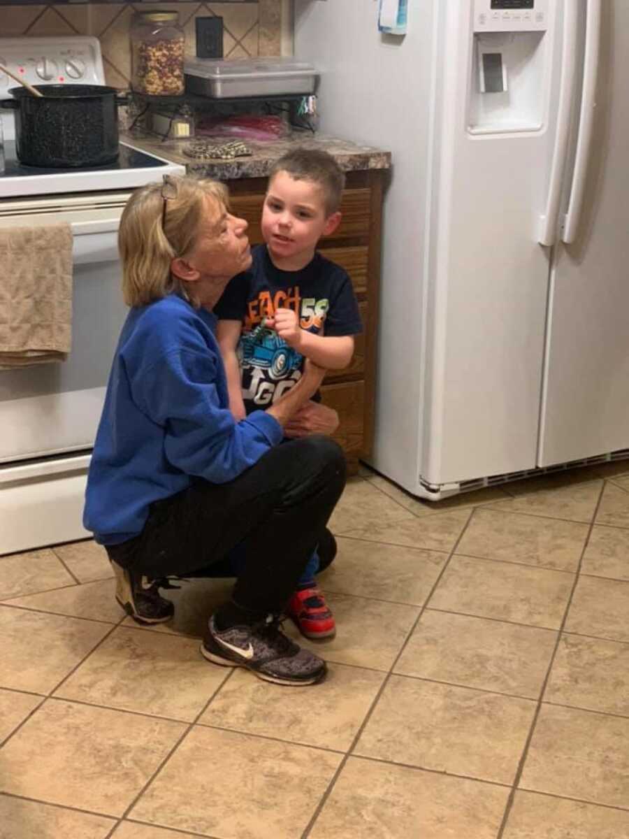 grandma with her grandson in the kitchen