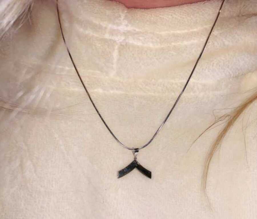 necklace that was lost in the grass
