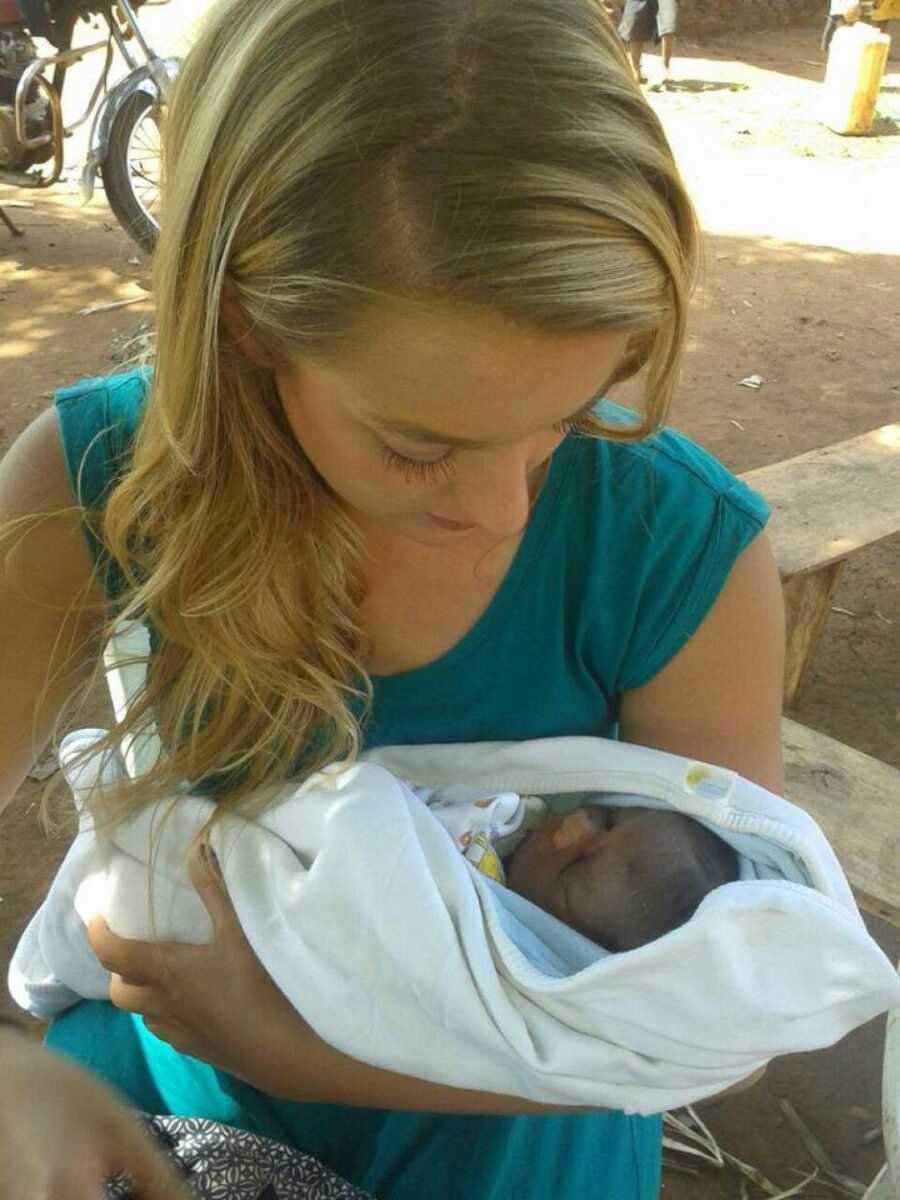 woman holding her new son