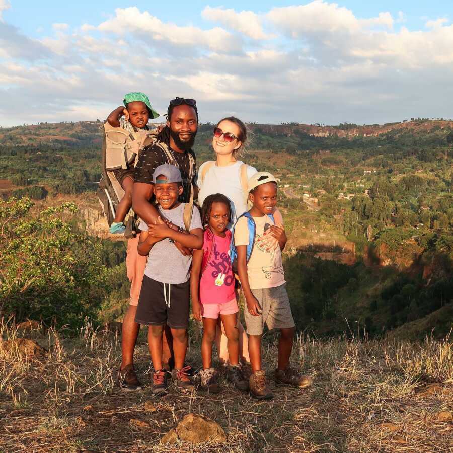 woman with her family in uganda