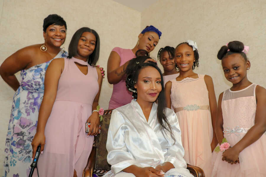 bride getting ready with family 