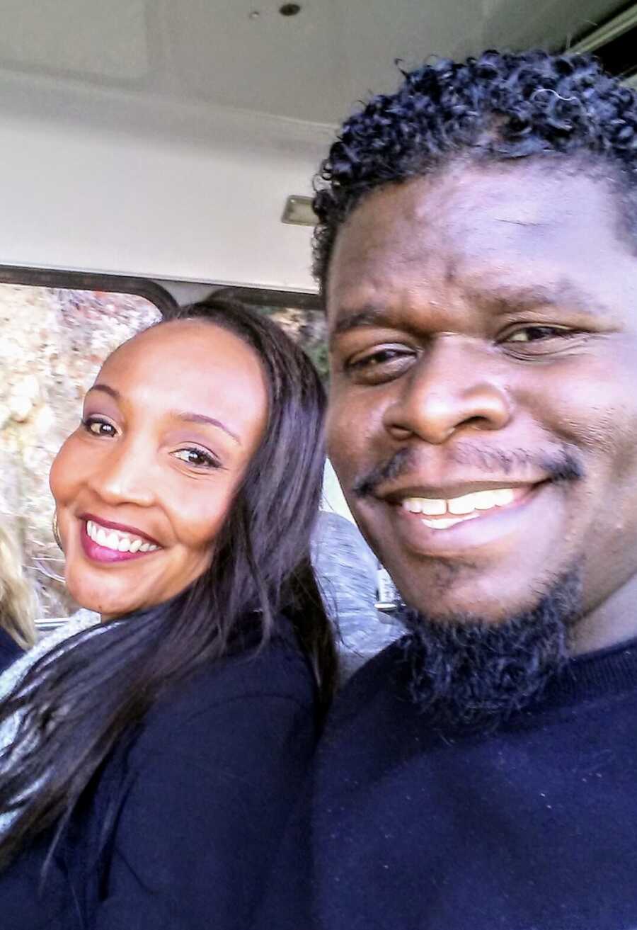 woman and husband smiling together