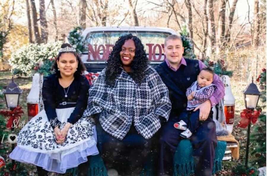 family taking photo together