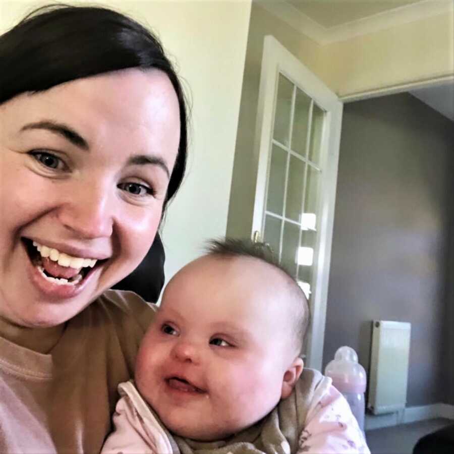 mom taking a selfie with daughter with down syndrome