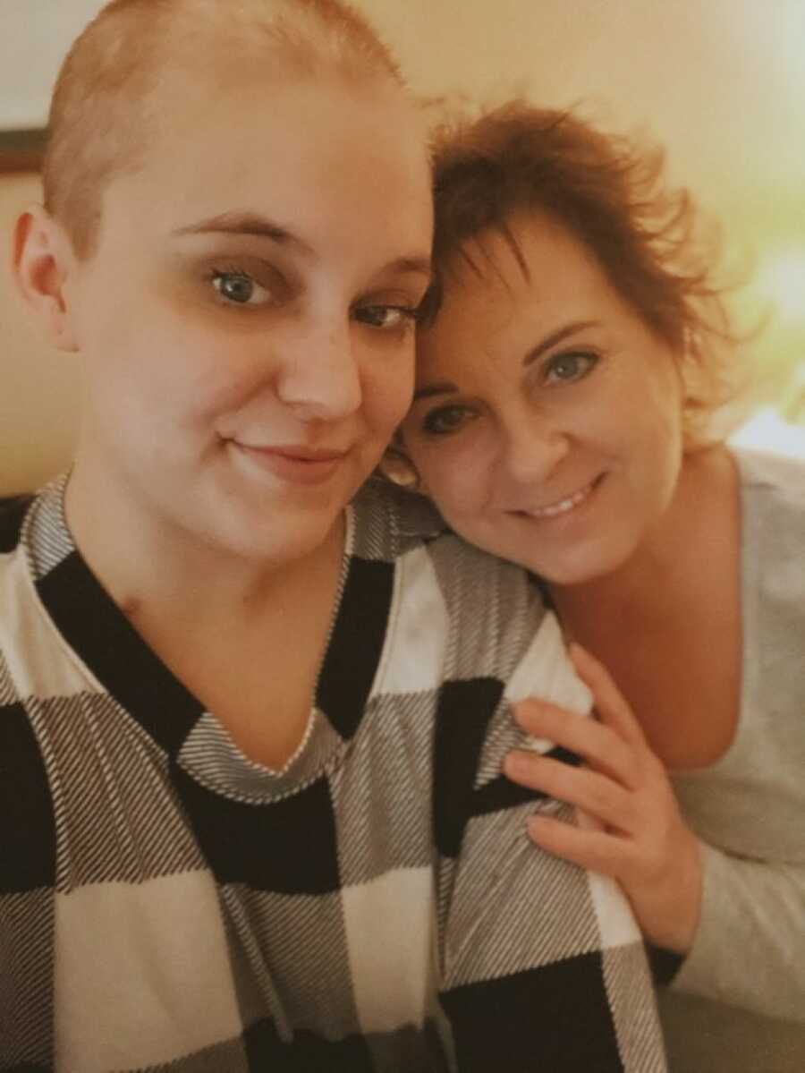 woman with cancer taking a selfie with mom