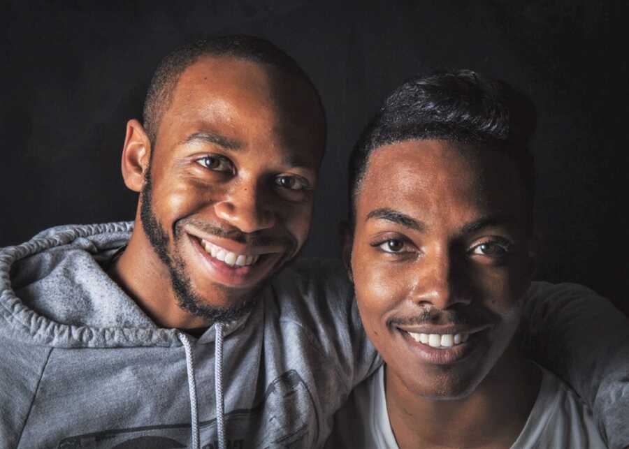professional portrait of two black men who are a couple