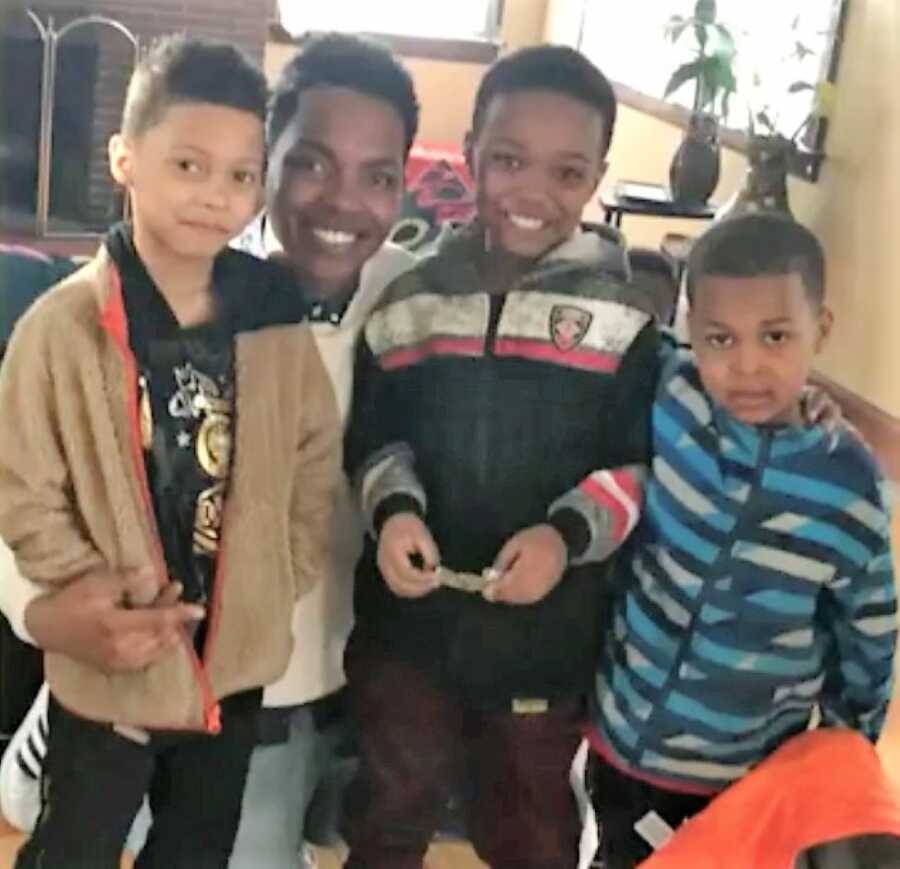 Black male adoptee reunited with his younger biological family members