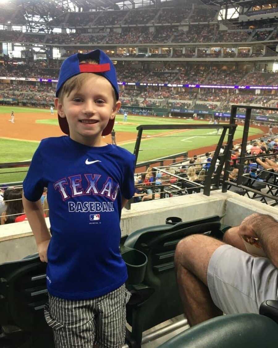 little boy at a baseball game