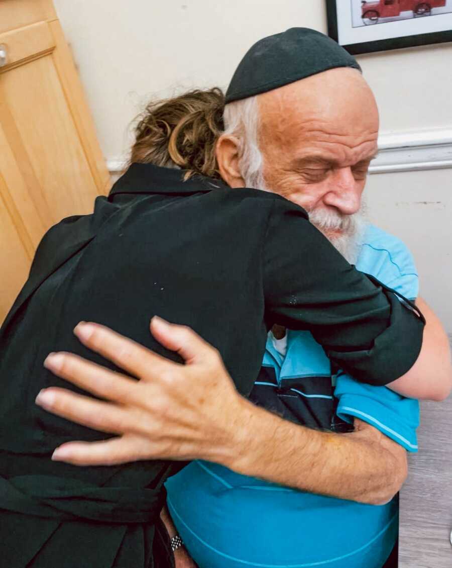 daughter hugging her father before passing