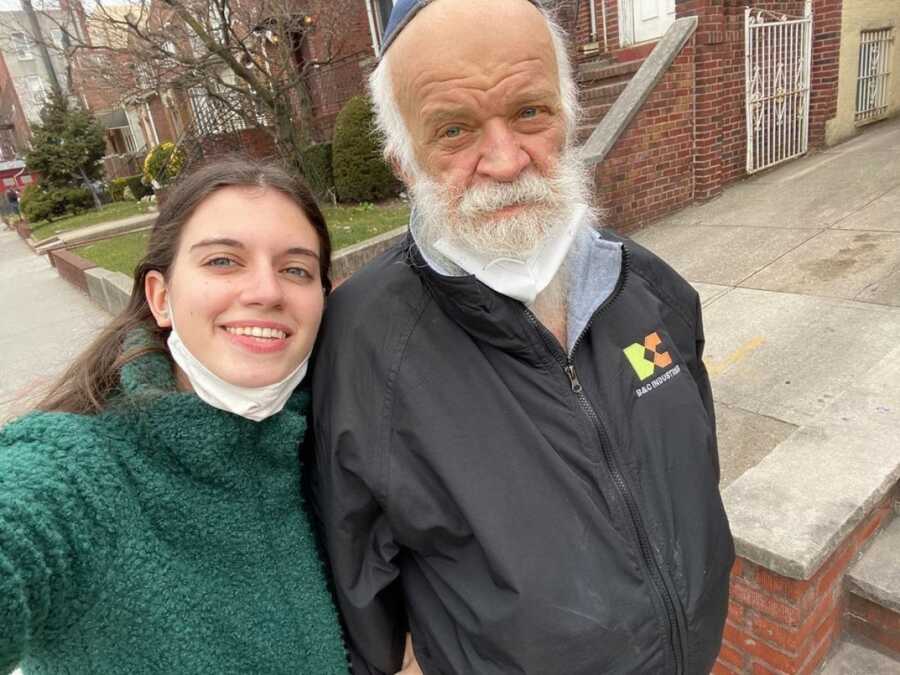 dad and daughter walking in the neighborhood