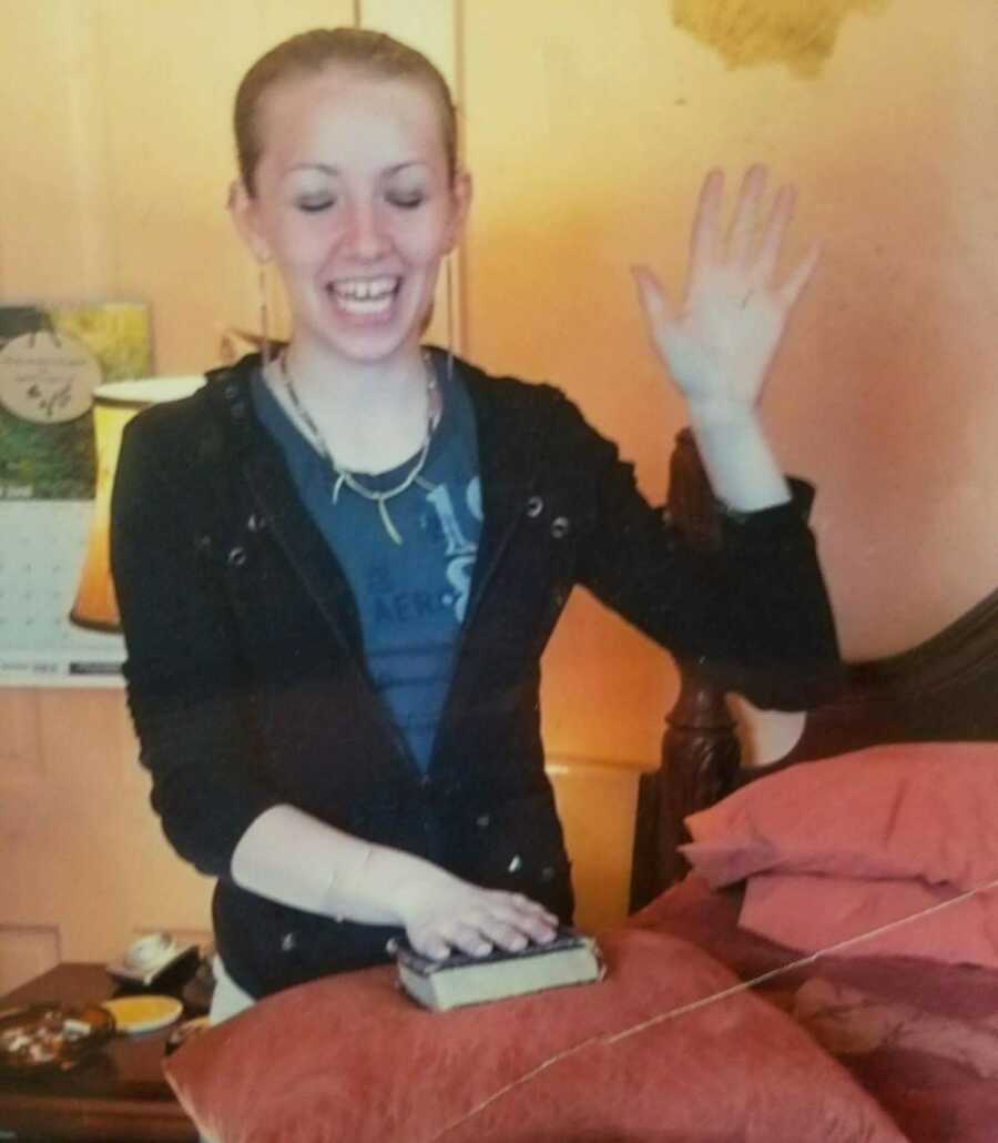 woman smiling and taking an oath