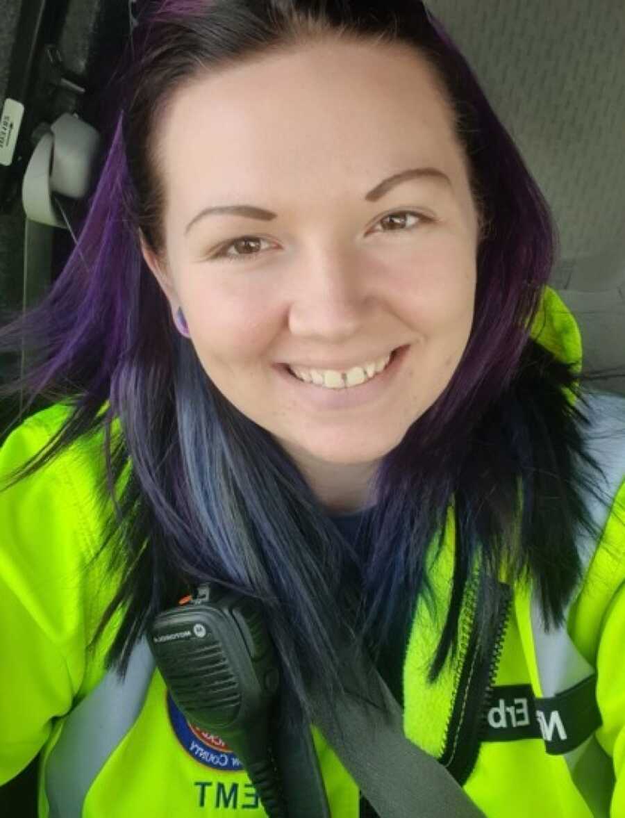 woman smiling and happy at her job