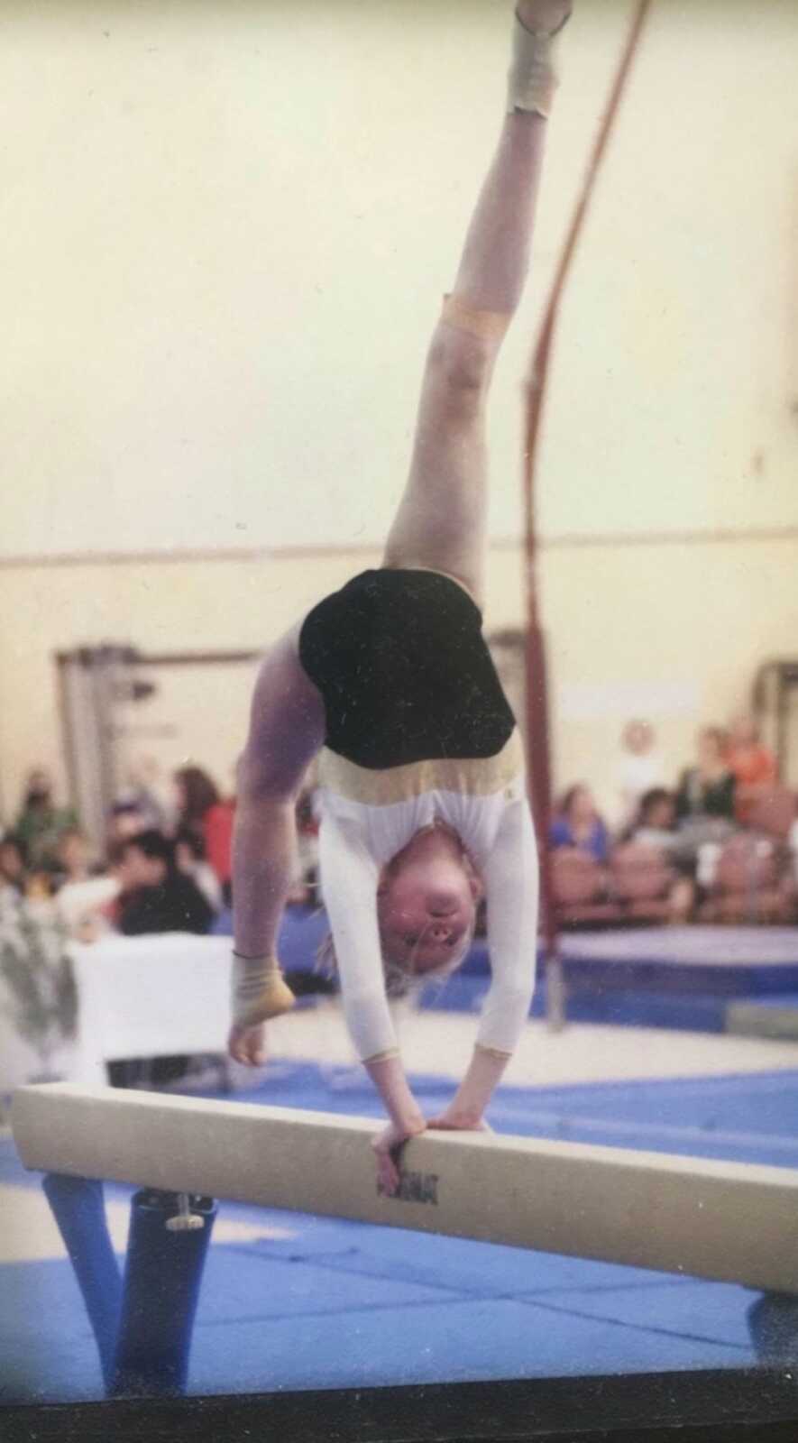 girl at gymnastics competition at age 10