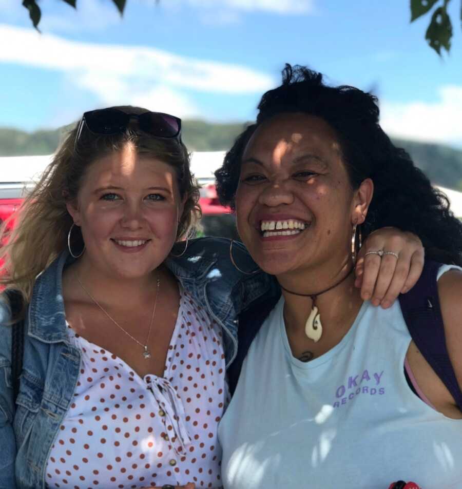 two women smiling for photo