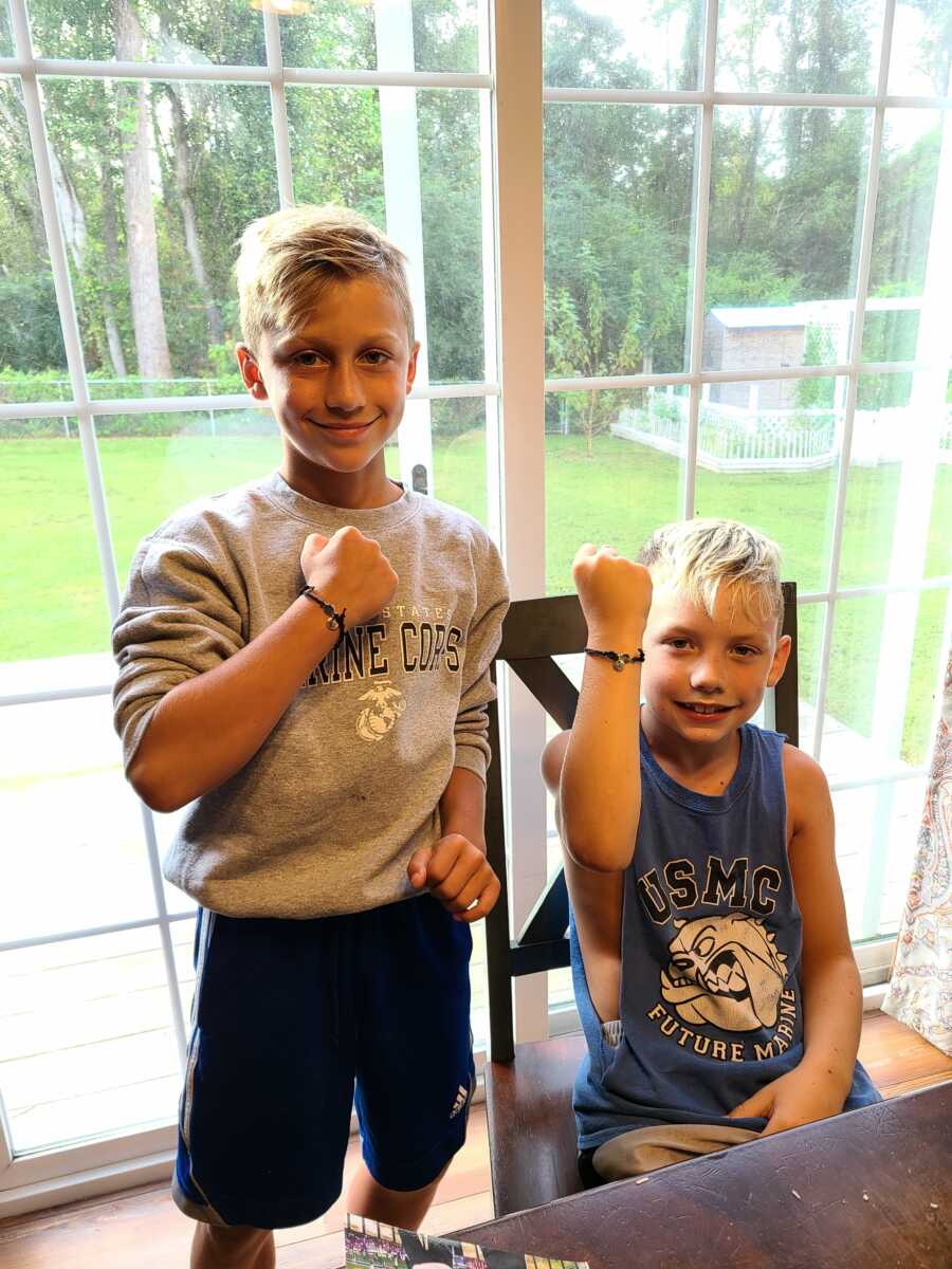 best friends showing their bracelets