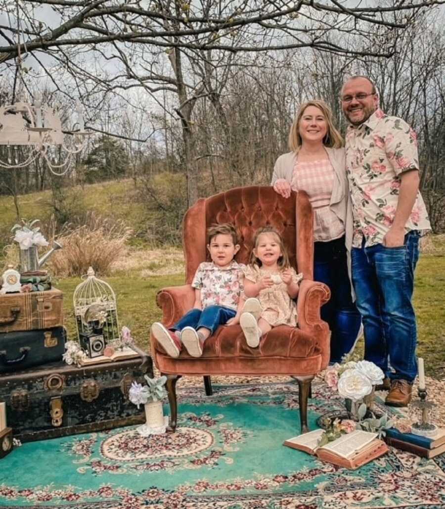 Couple take family pictures with adopted siblings.