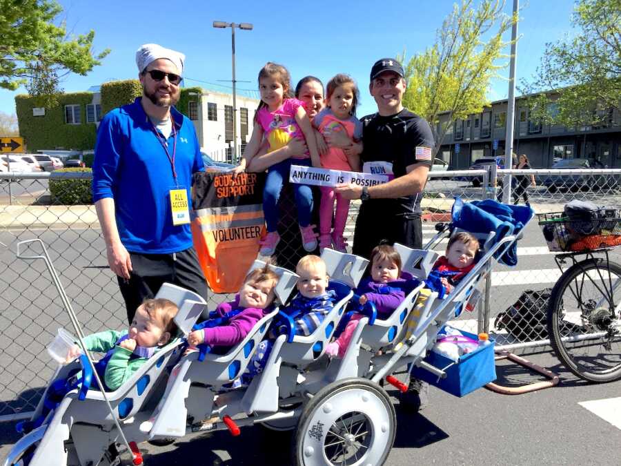 family poses at full marathon that father will run pushing quintuplets, sets world record