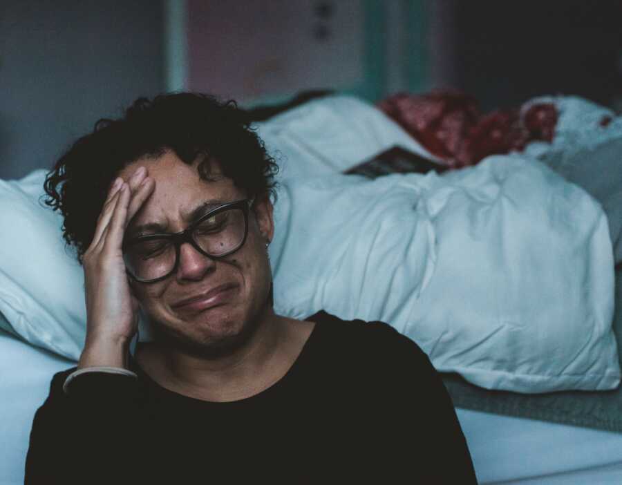 woman crying from emotional abuse 