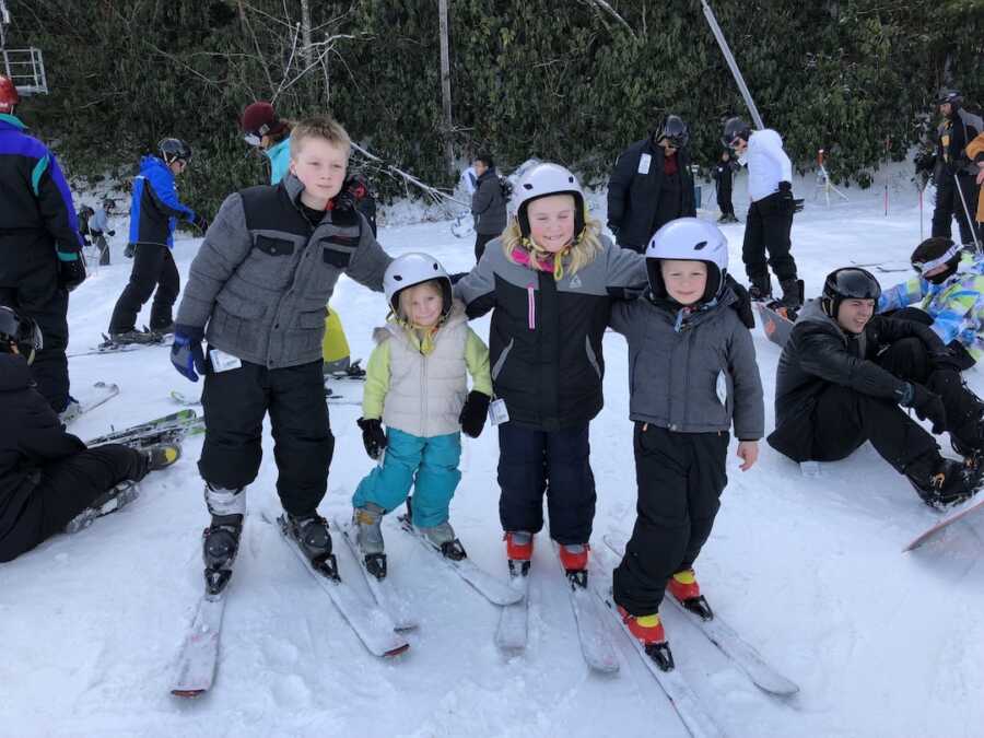 children of a blended family together on a ski trip