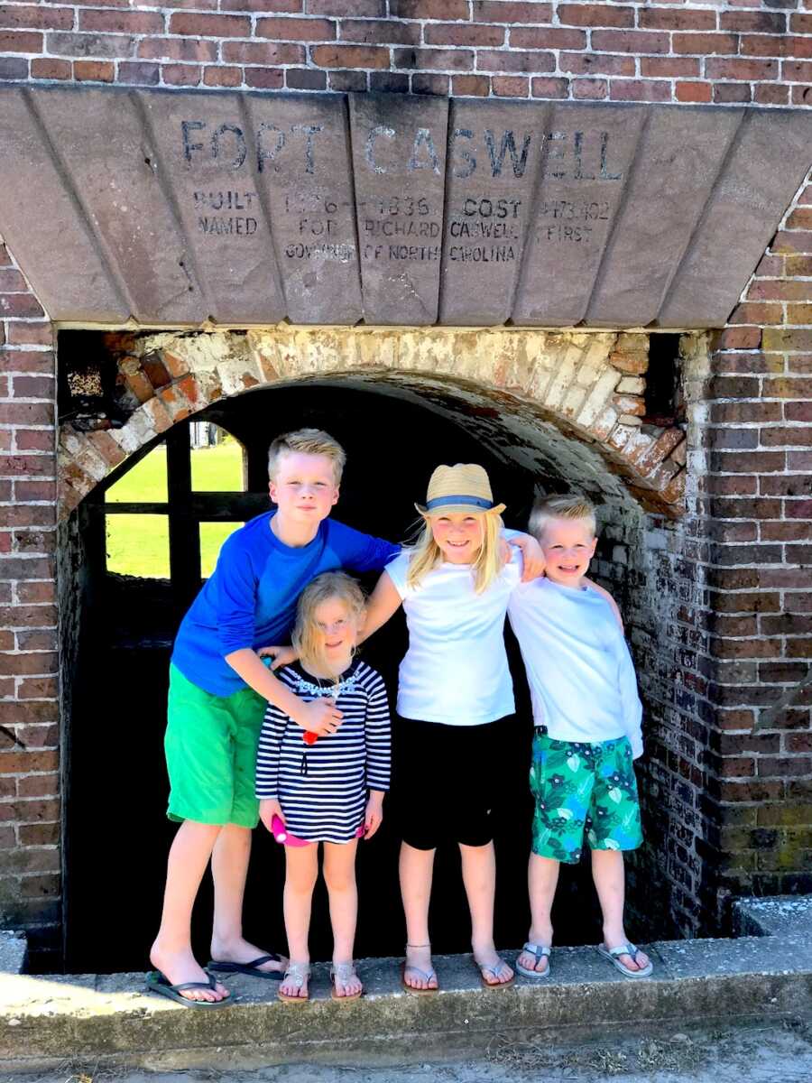 children of a blended family pose together