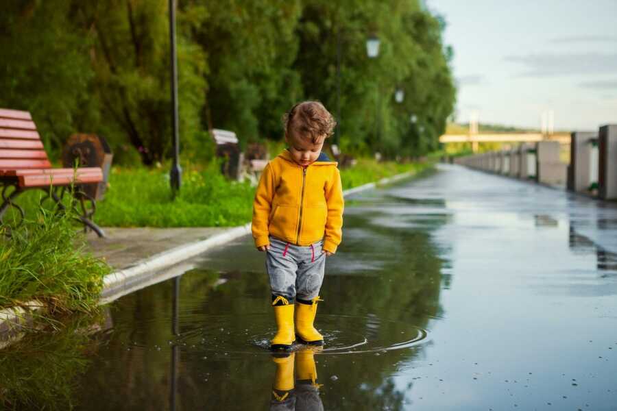 kid looking at his boots