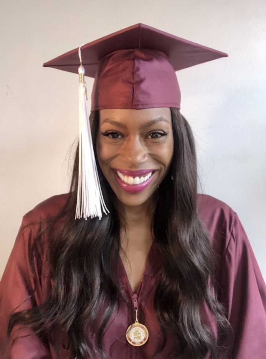 woman in graduation cap and gown 