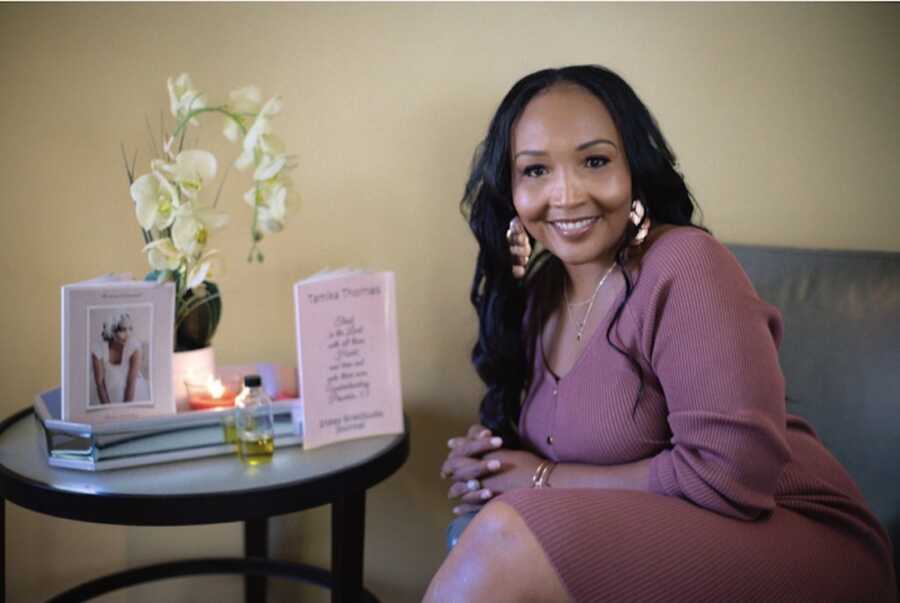 Woman sitting and smiling 