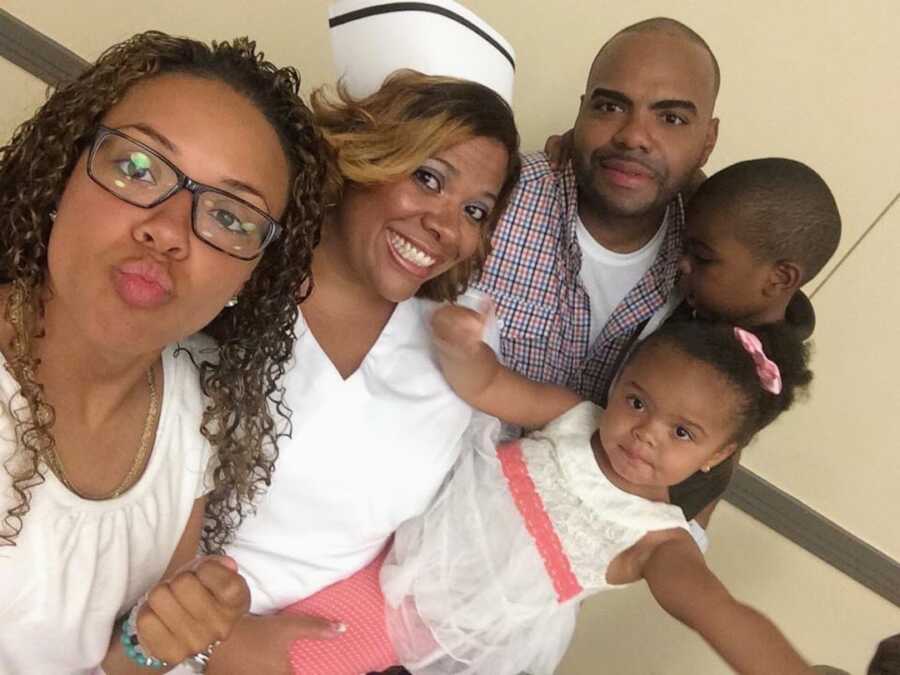 military family poses together for a selfie