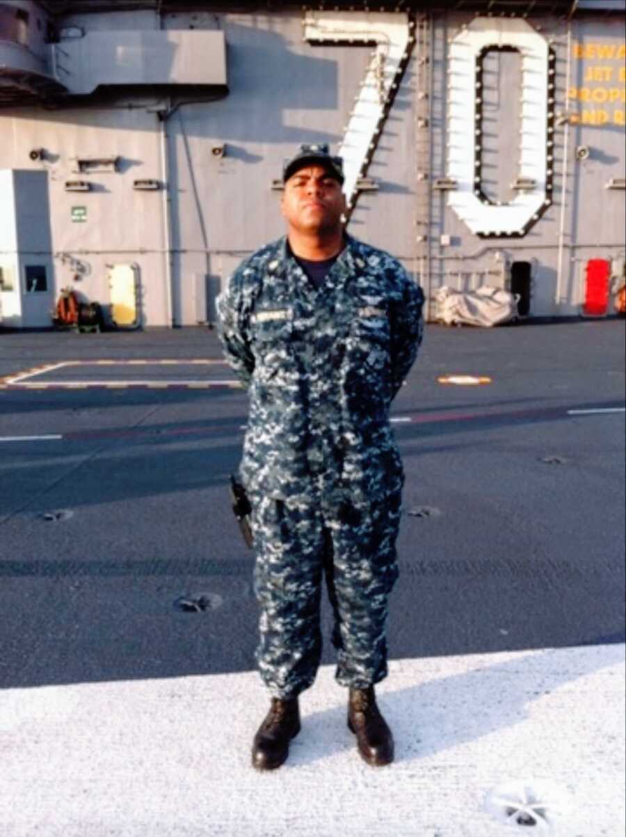 navy seal stands in uniform on the ship