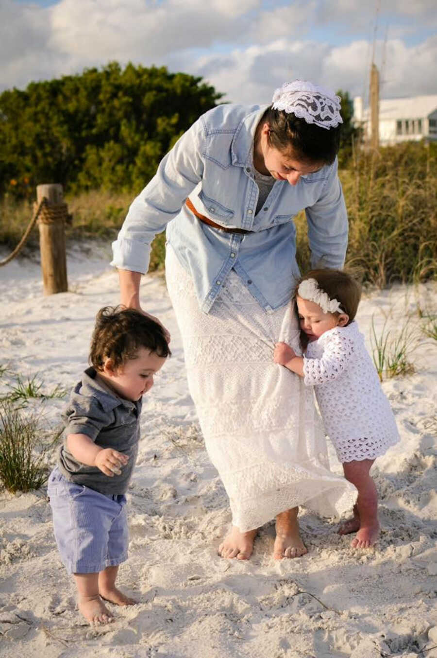 Mom with twins at the beach 