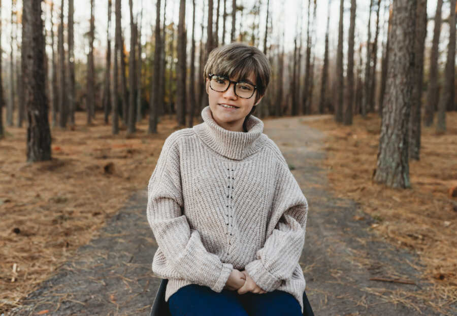 girl in wheelchair smiling 