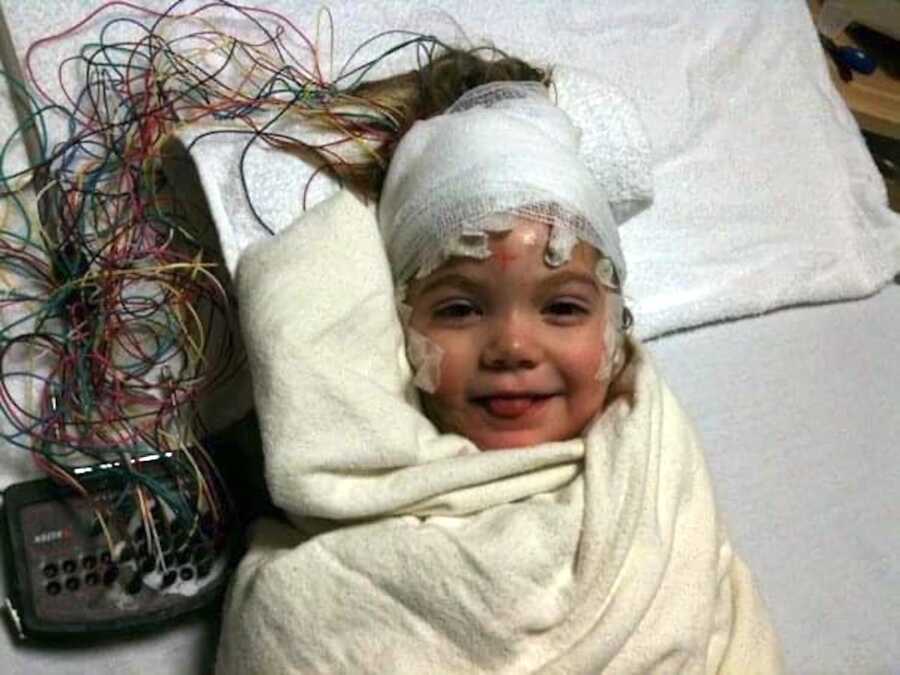 little girl in hospital bed 