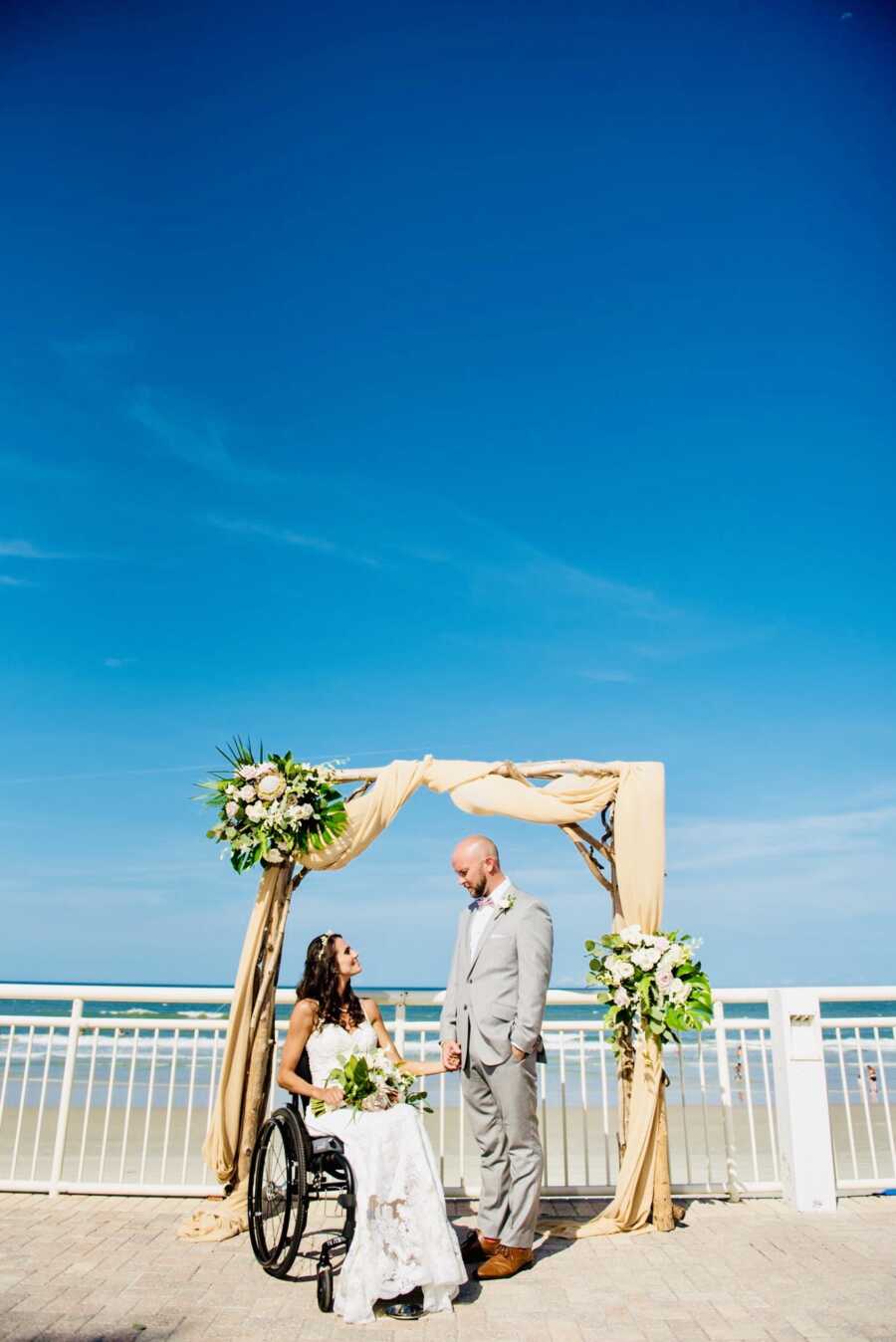 husband and wife at the alter