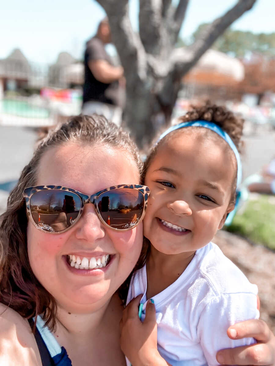 mom and daughter taking a selfie