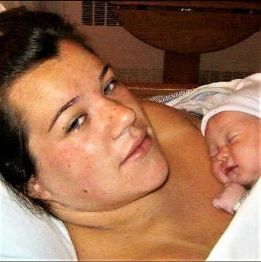 mom holding baby after birth