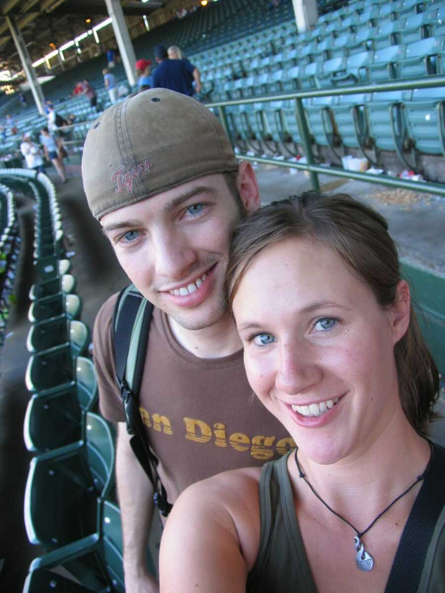 couple together at baseball game
