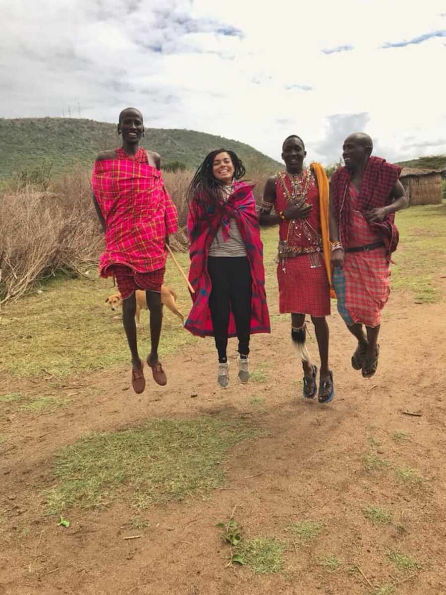 woman jumping with others 