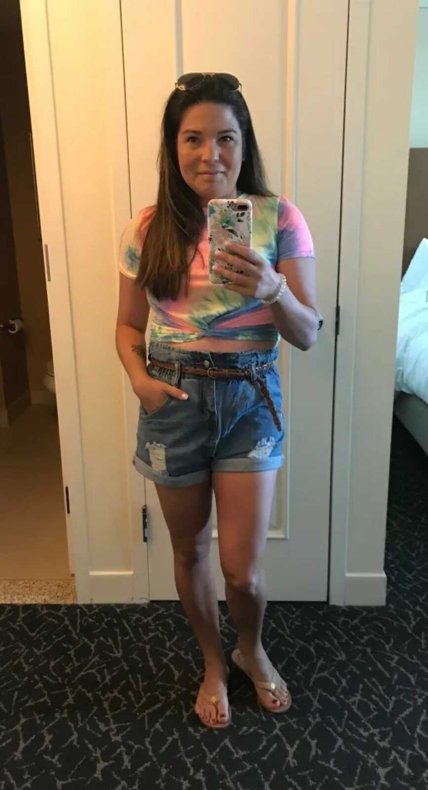 woman taking a selfie in a mirror