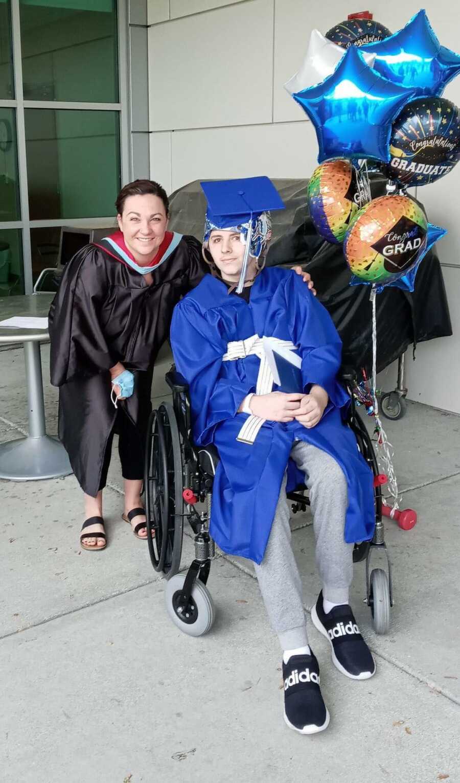 teacher and student taking photo together