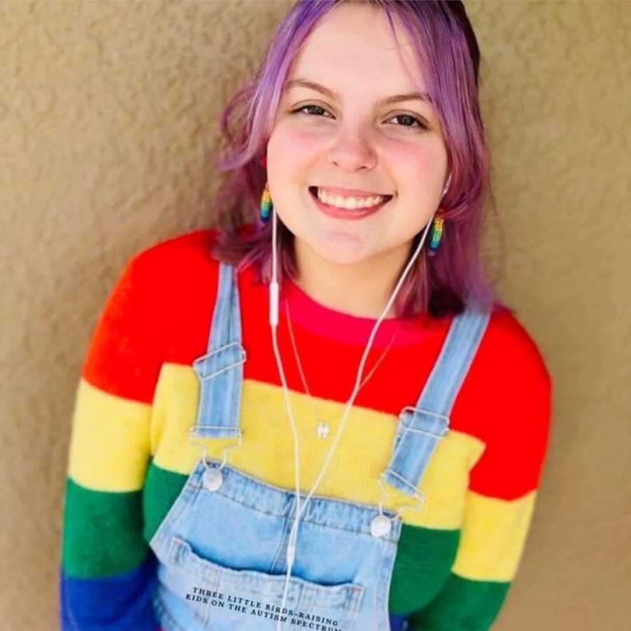 daughter in pride clothes smiling 