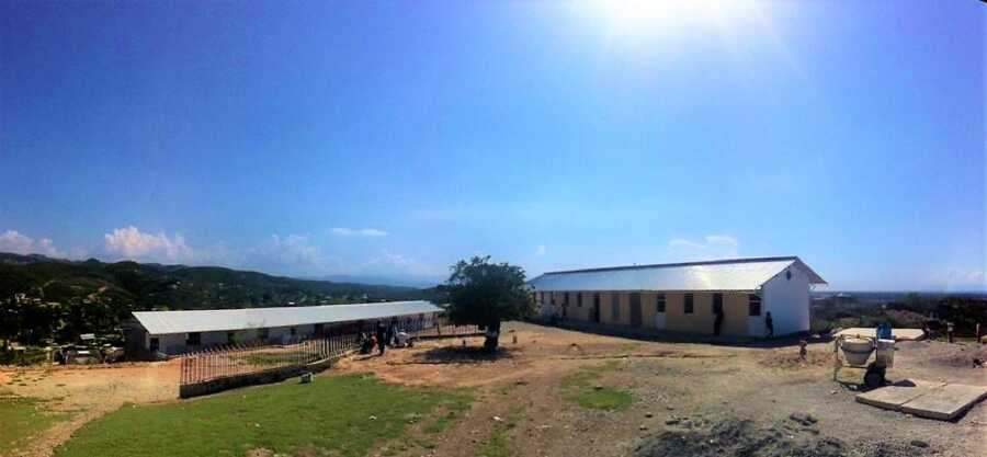 Two long buildings part of a non profit organization at a mountain top in Haiti 