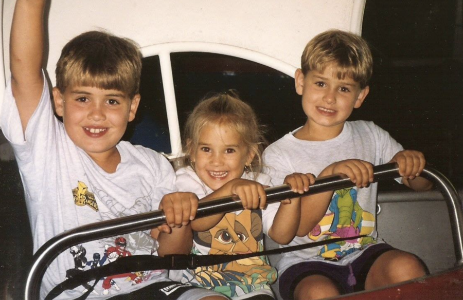 siblings smiling together