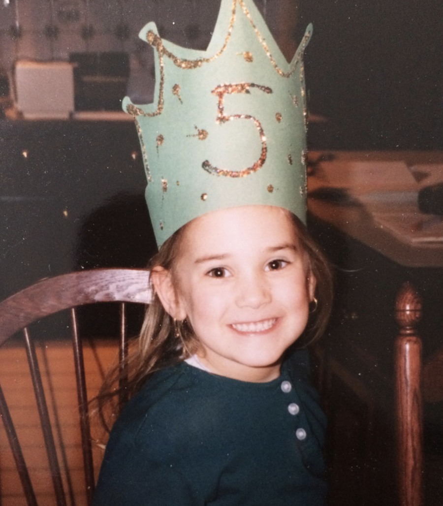 little girl celebrating her fifth birthday