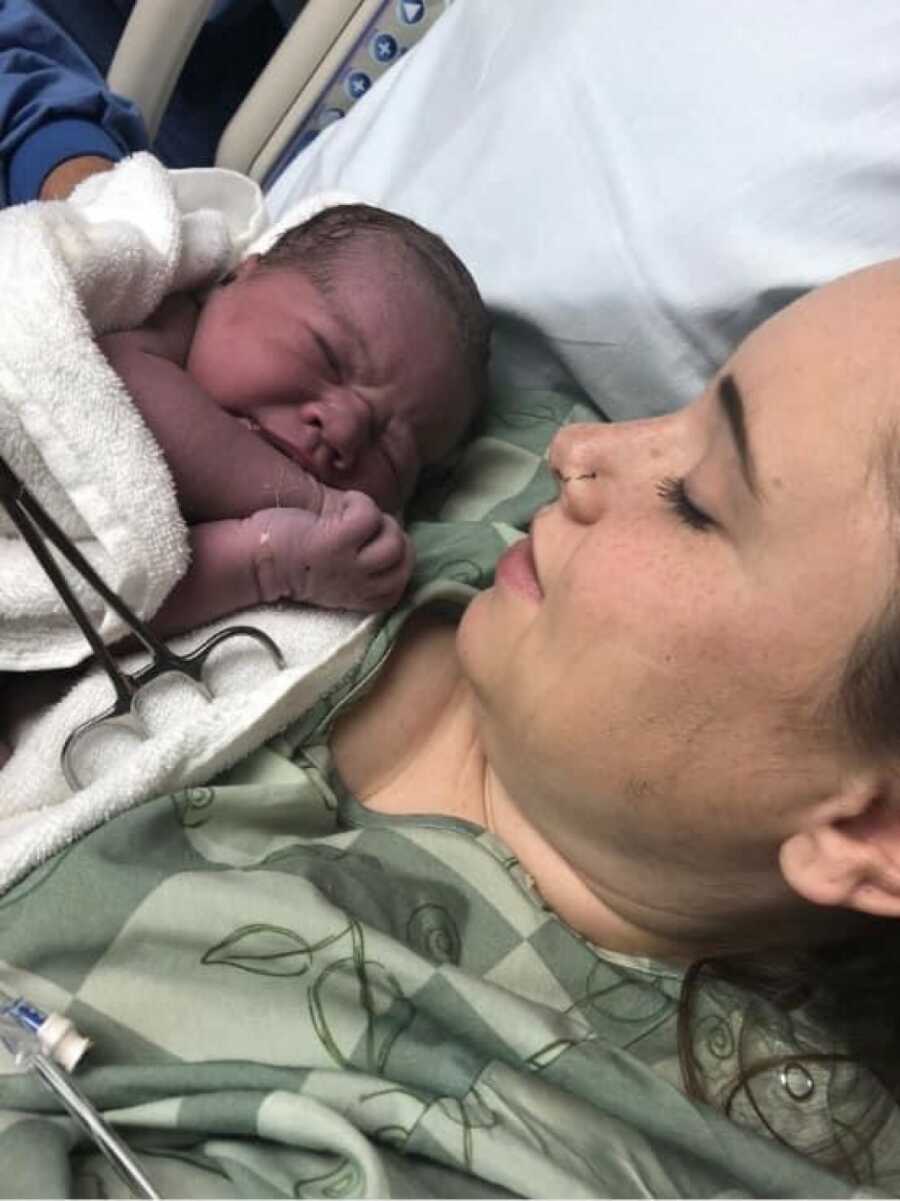 mom holding new born
